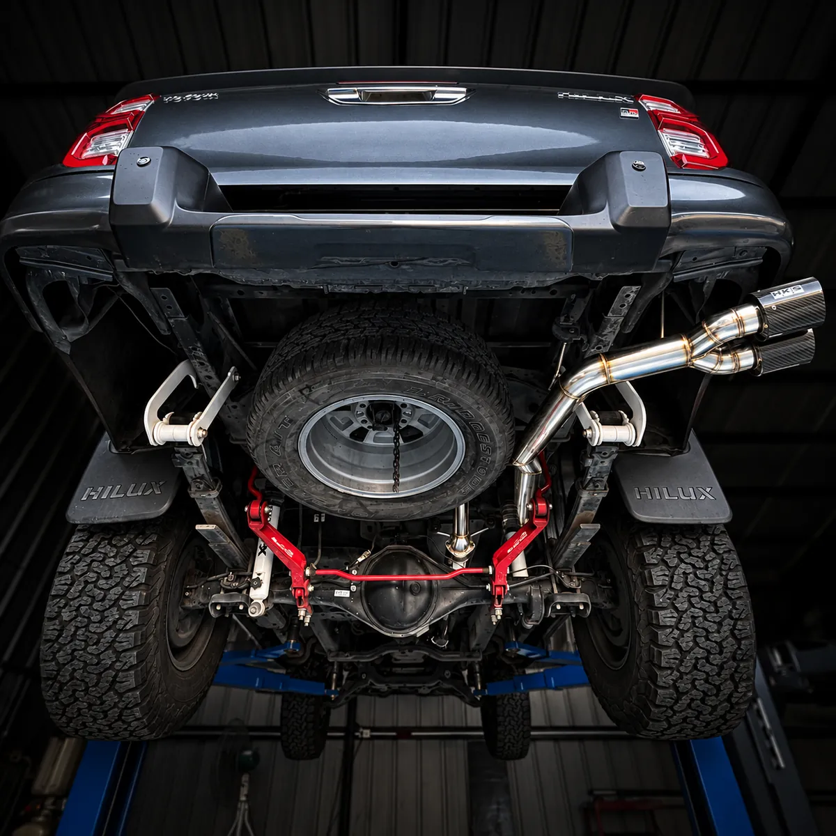 Full exhaust on a diesel pickup seen from behind