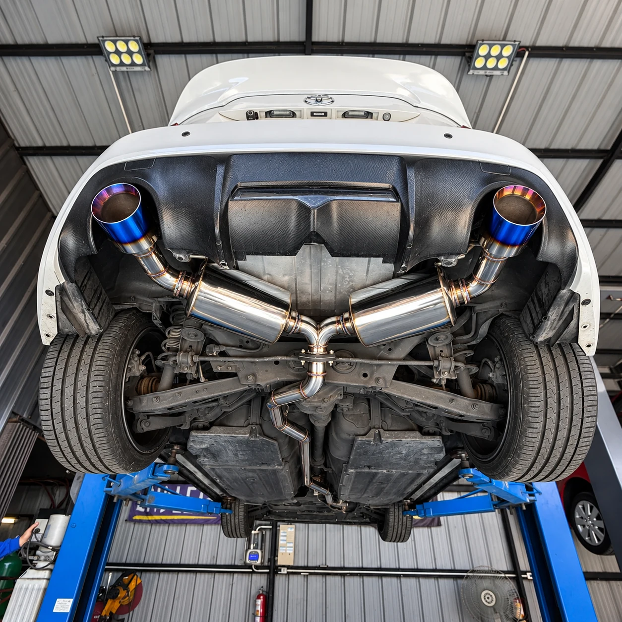 Custom exhaust fabrication under a gas-engine vehicle