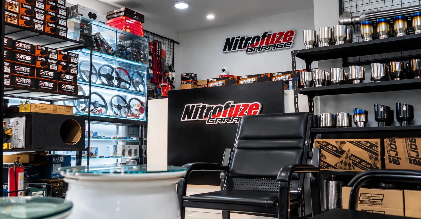 Showroom counter with the Nitrofuze logo sign