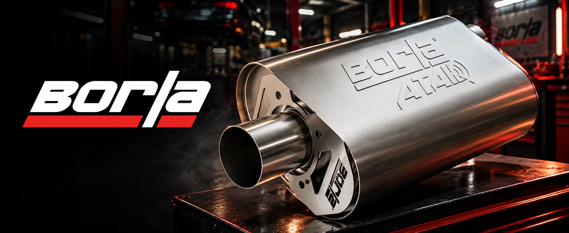 Borla ATAK muffler on a shop bench with the Borla logo