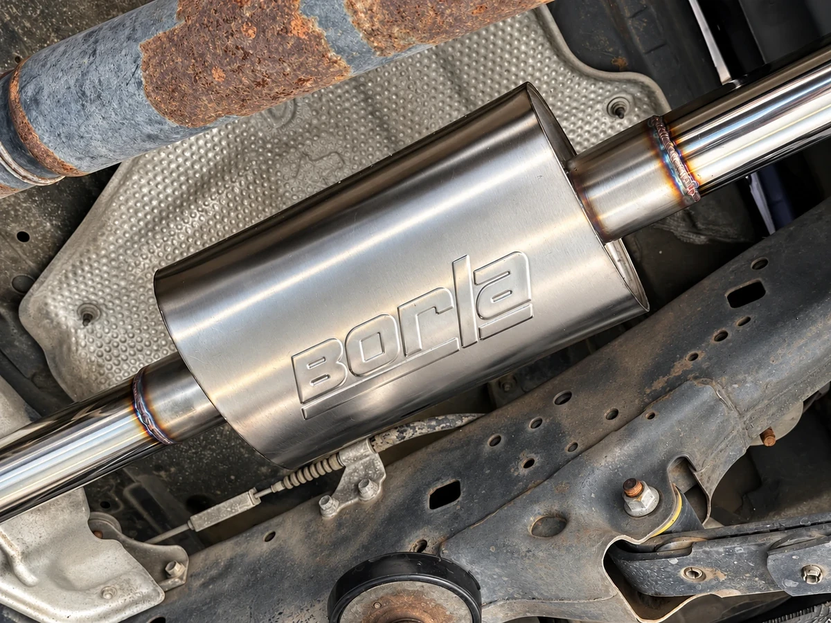 Borla XR-1 Sportsman muffler with its embossed logo, installed in a custom exhaust